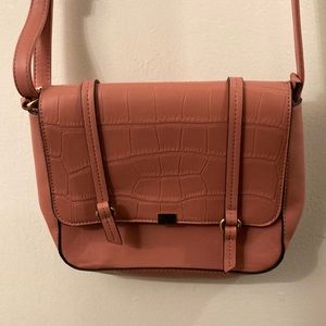 Coral colored purse (unknown brand)